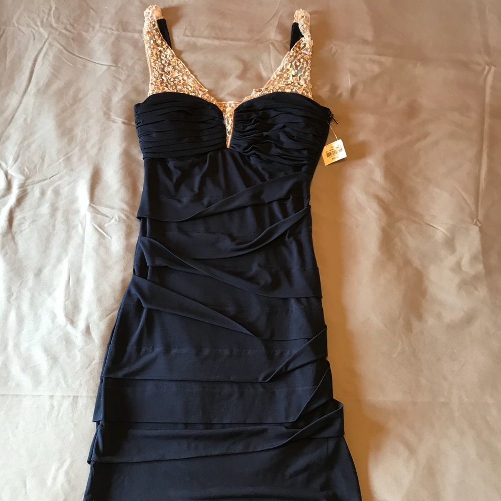 Brand new navy beaded prom/homecoming dress.